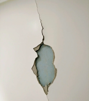 décollement mur
